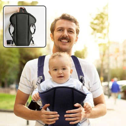 Papa utilisant un porte-bébé physiologique ajustable pour balade-sphere de maman-nourrison