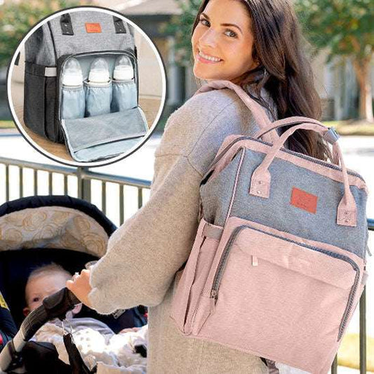 Sac à langer gris avec biberons, couches et jouets organisés dans les compartiments-sphere de maman-nourrison
