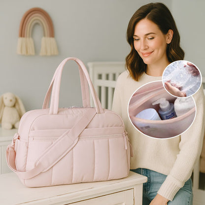 Sac à langer imperméable ALTERTotes gris clair, ouvert, montrant l’intérieur spacieux avec des biberons, couches et vêtements de bébé bien organisés-sphere de maman-nourrison