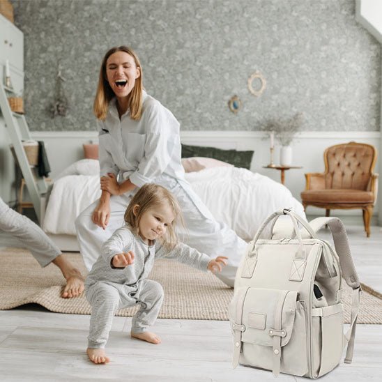 Sac à langer kaki ouvert montrant les poches isothermes pour biberons-sphere de maman-nourrison