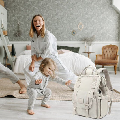 Sac à langer kaki ouvert montrant les poches isothermes pour biberons-sphere de maman-nourrison