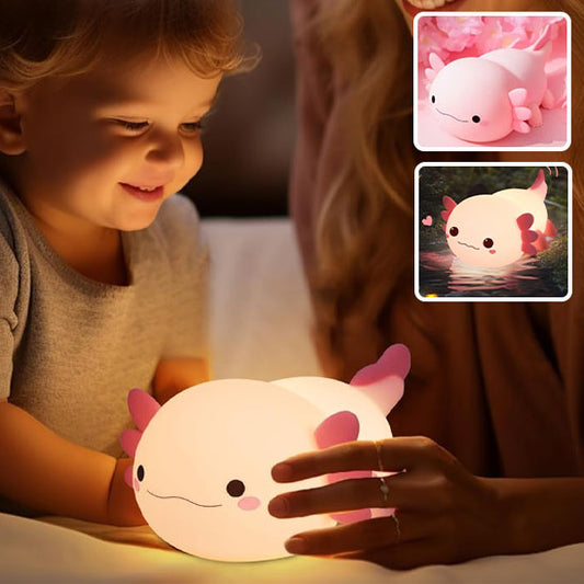 Veilleuse Axolotl silicone rose allumée sur table de nuit-sphere de maman-nourrrison