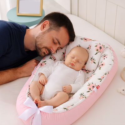 Reducteur de lit bébé ergonomique pour un sommeil sécurisé et confortable dès la naissance